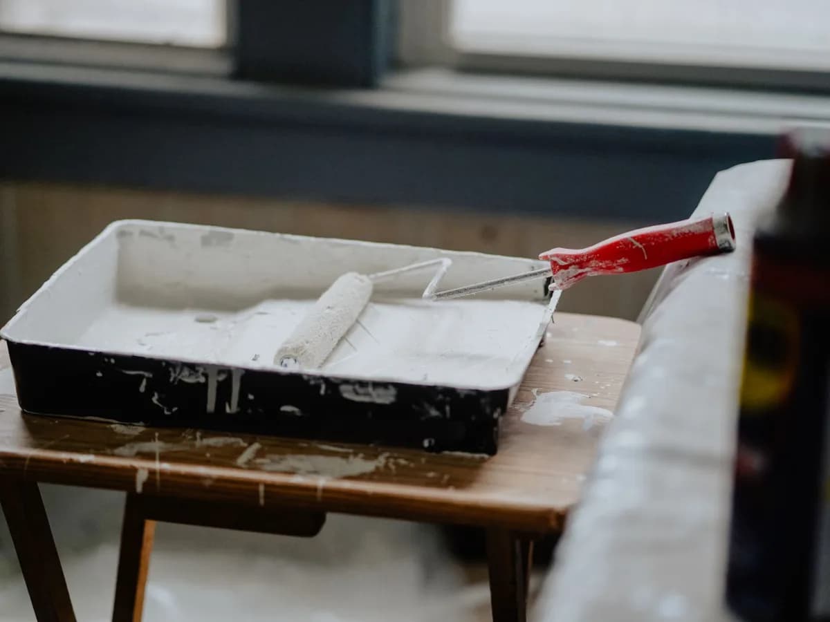 Cleaning supplies in renovated bathroom