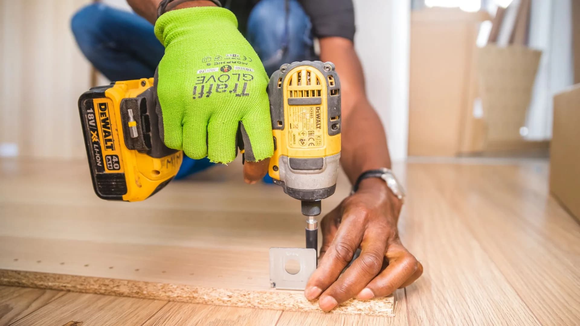 Handyman fixing a leaky faucet