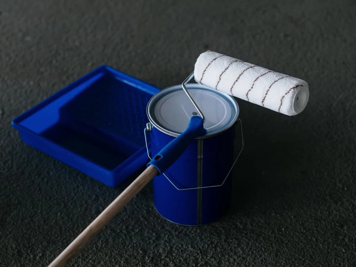 Tools and materials for drywall repair on a table