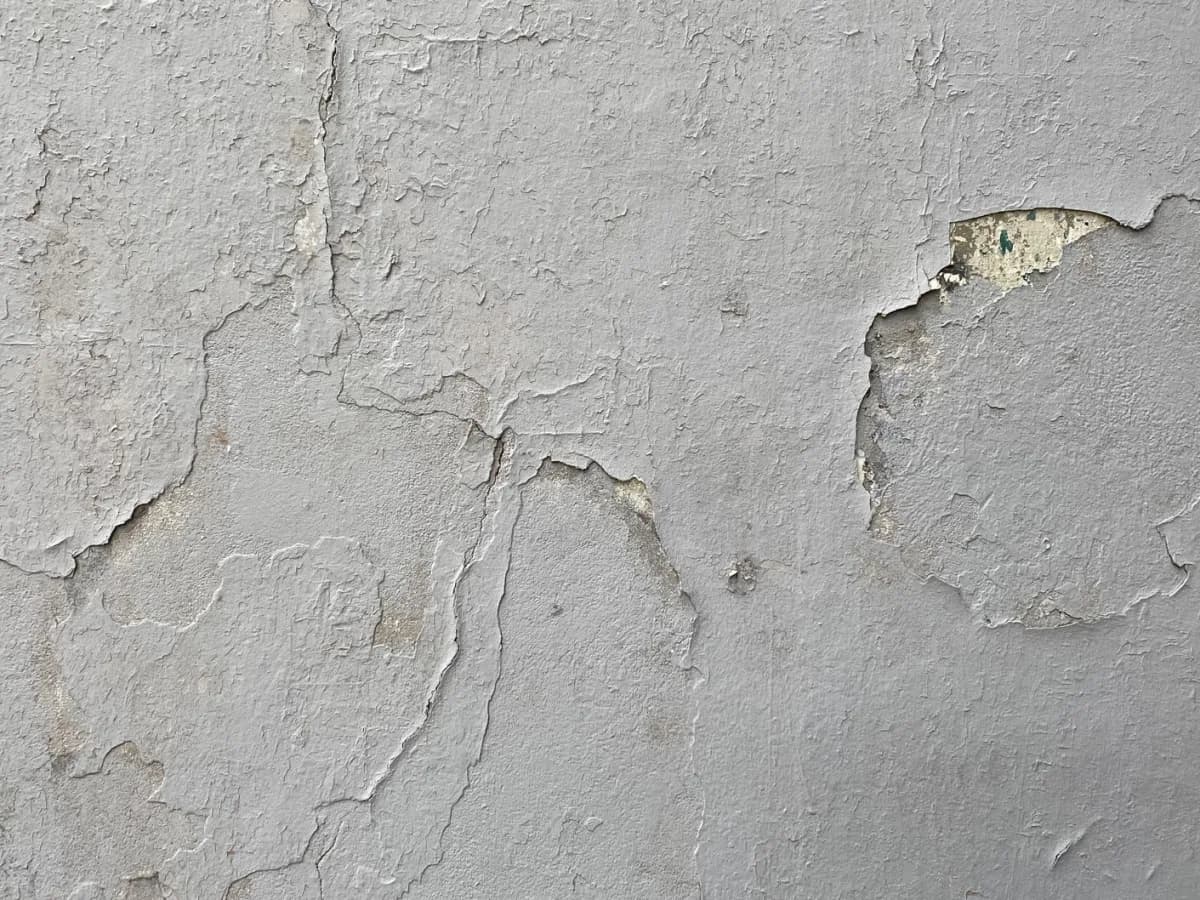 Close up of cracked drywall damage