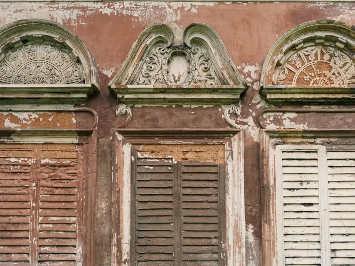 Close-up of cracked caulking around windows