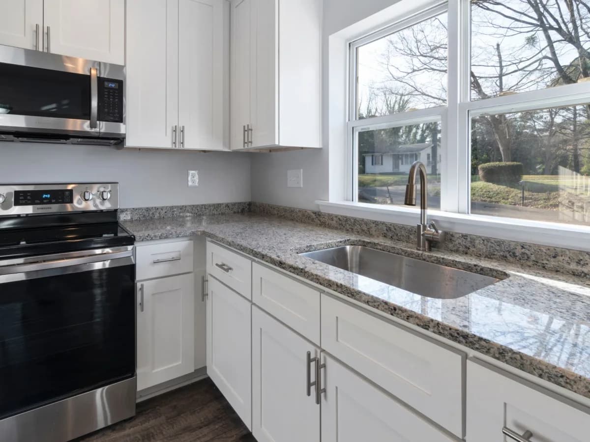 Finished caulking job around kitchen window