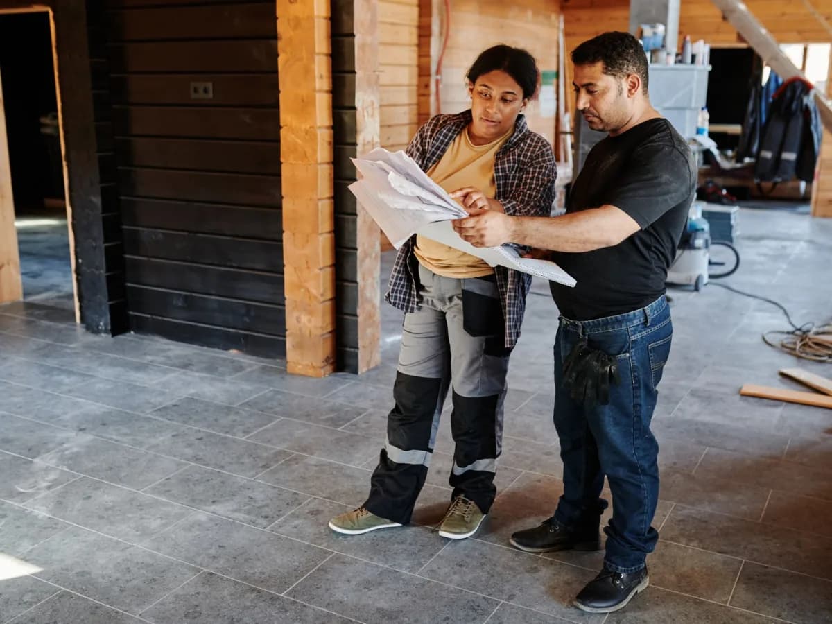 Homeowner talking to HVAC contractor