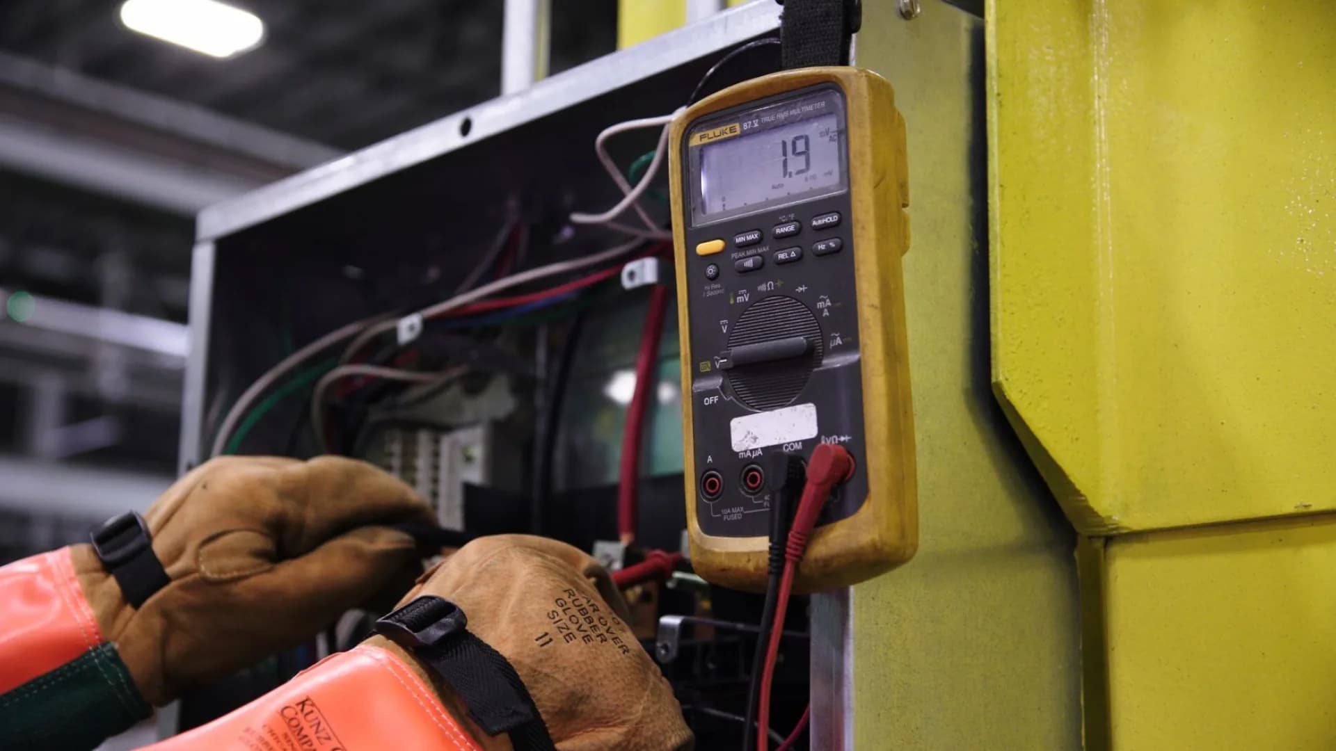 HVAC technician inspecting unit at a Toronto home