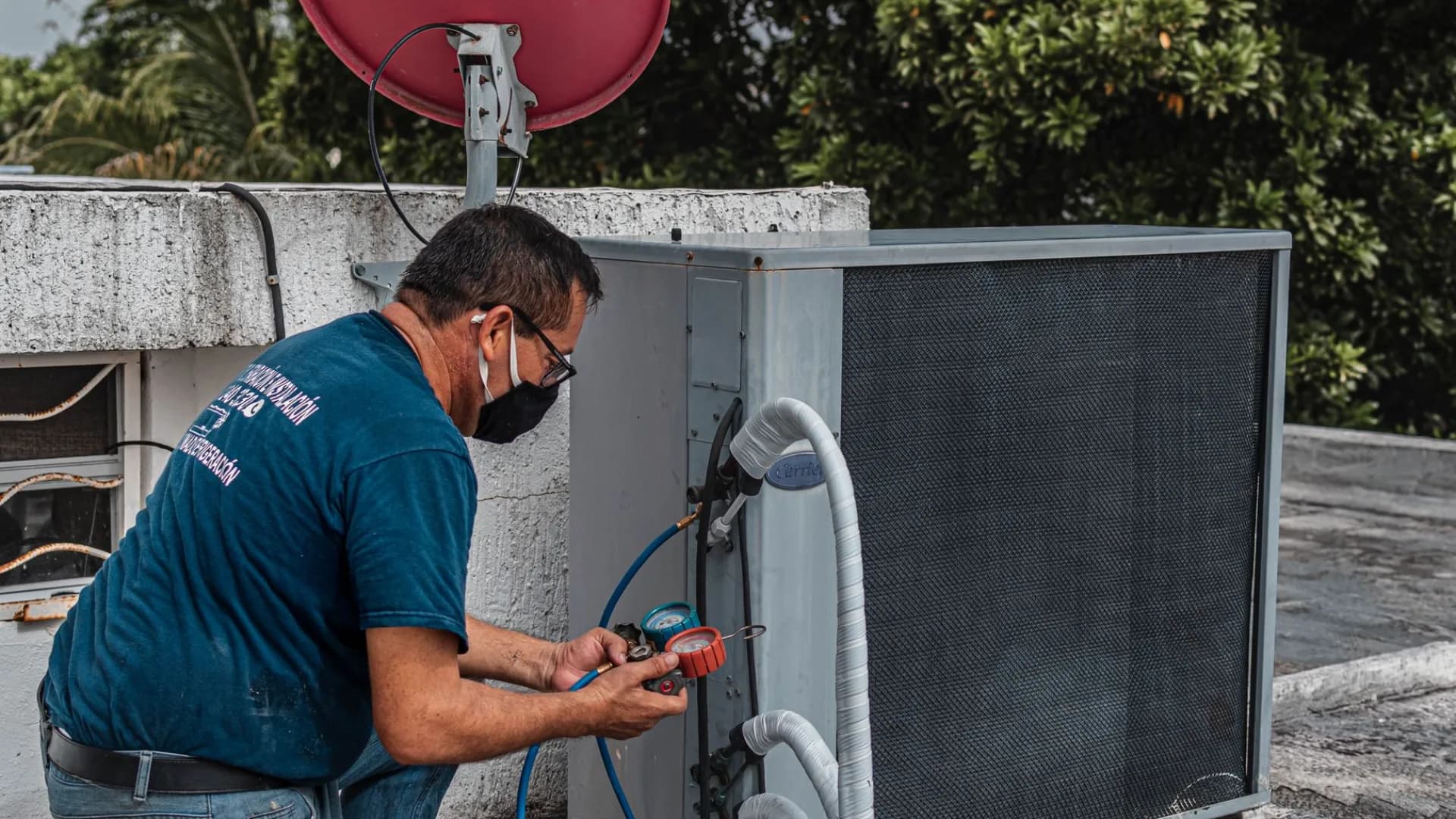 HVAC technician checking system in Toronto home