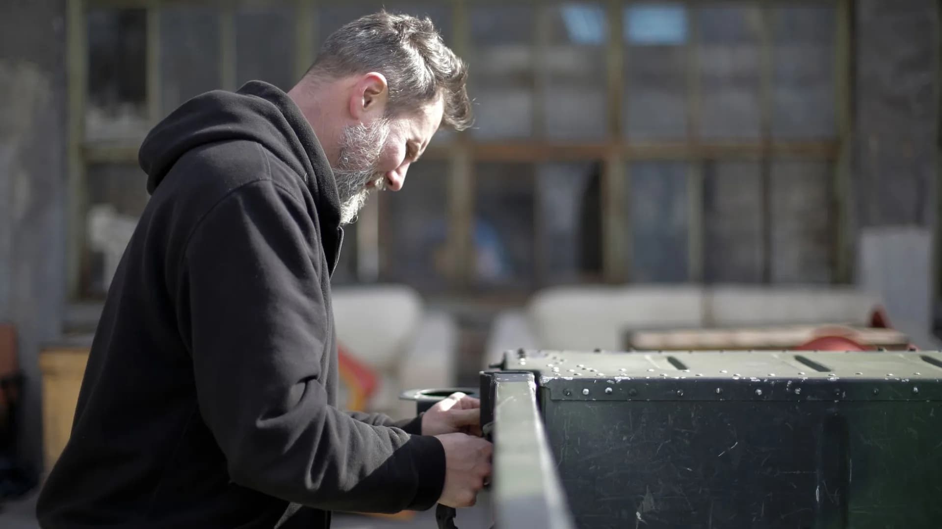 Technician inspecting home ductwork for cleaning