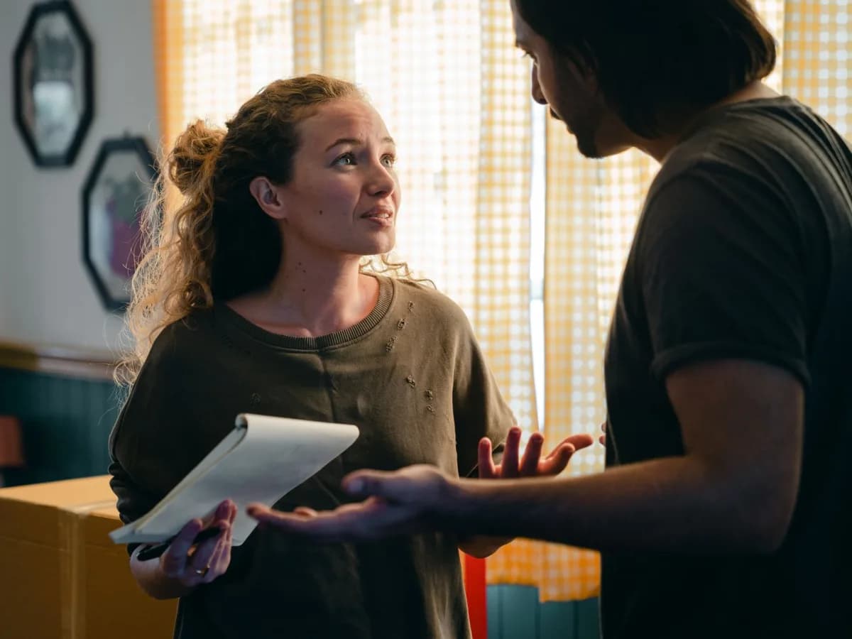 Homeowner consulting with technician
