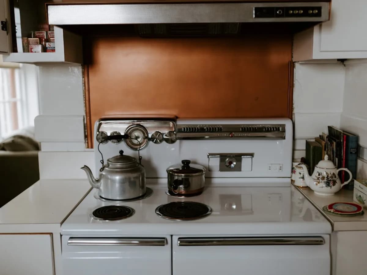 Close-up of a damaged range hood