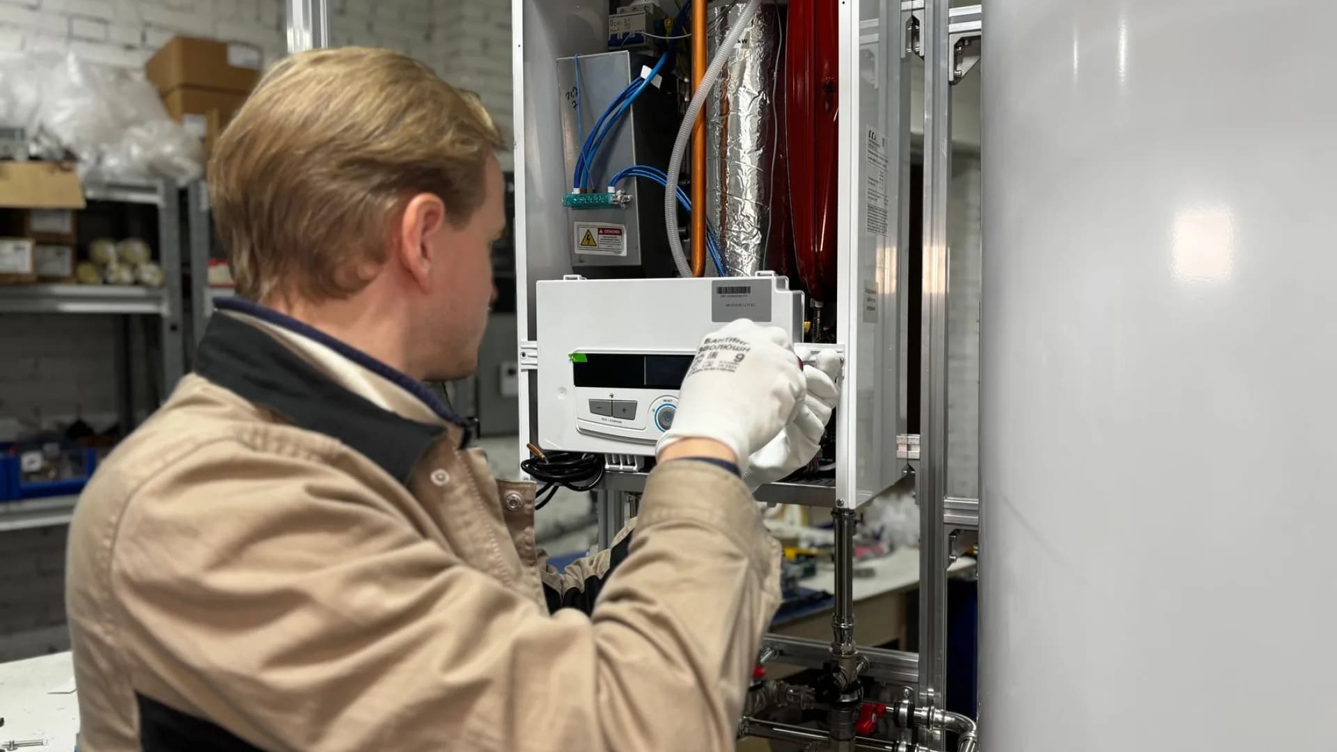 Technician installing a humidifier in a home