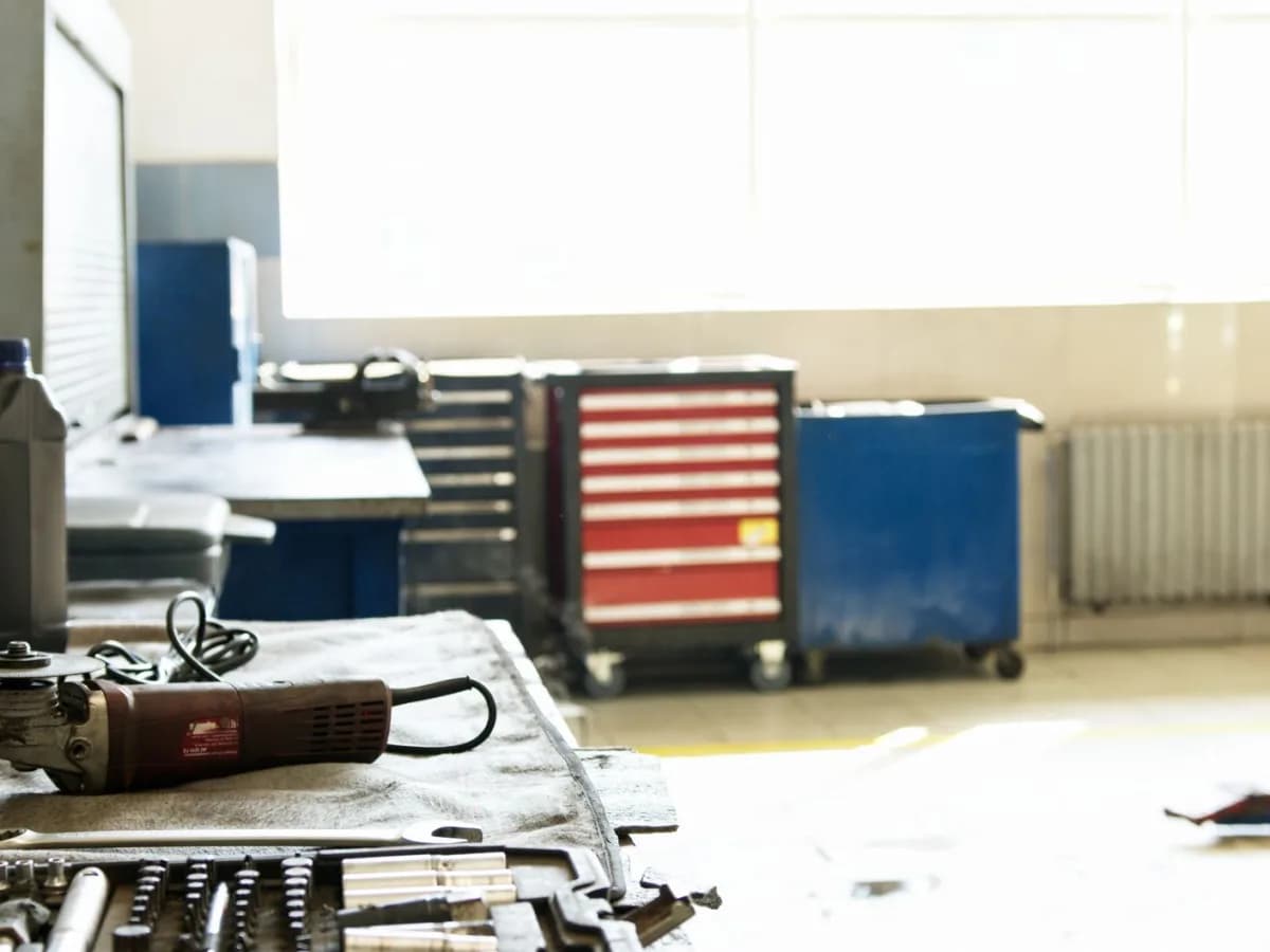 Various appliance repair tools on a workbench