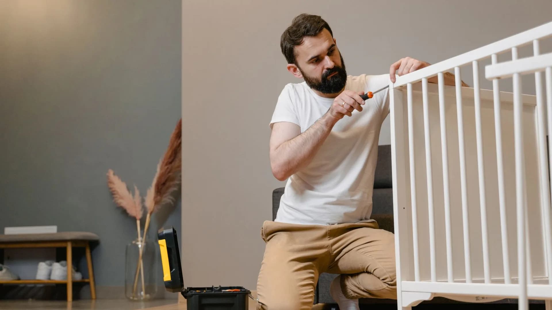 Person assembling furniture in Toronto
