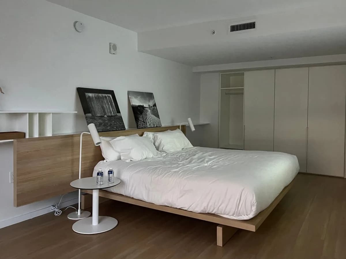 Finished bed frame assembly in bedroom