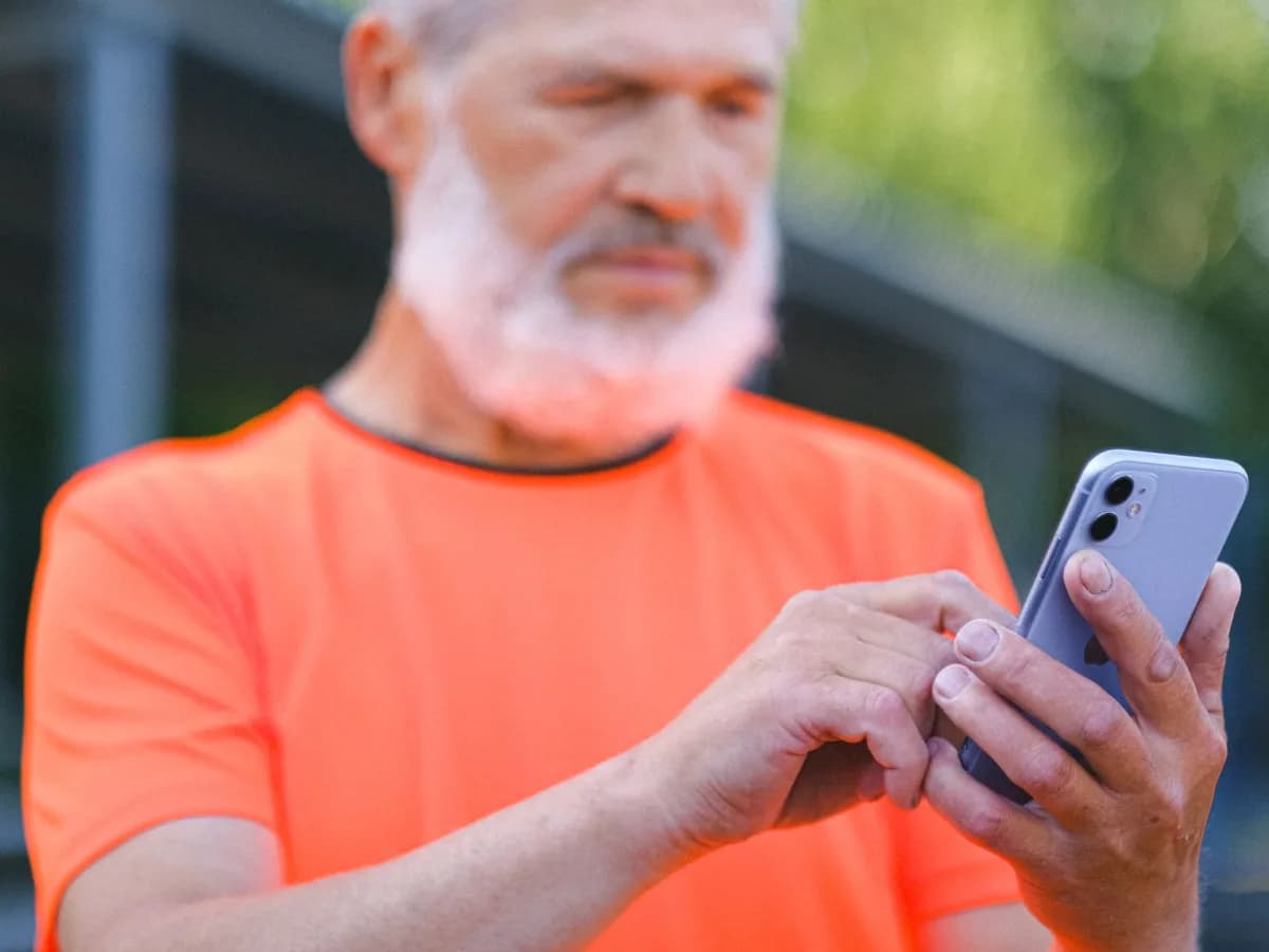 Installer reviewing camera feed on phone