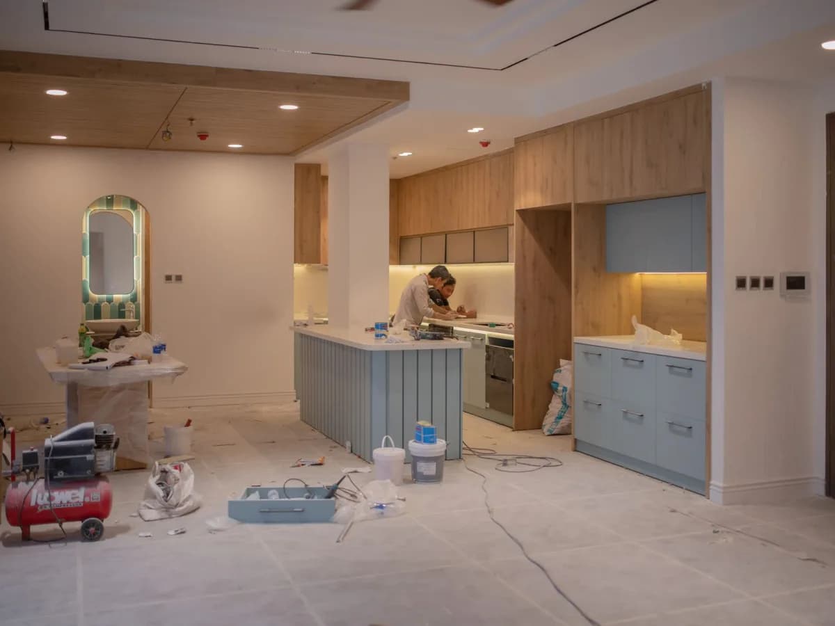 Technician inspecting kitchen countertops
