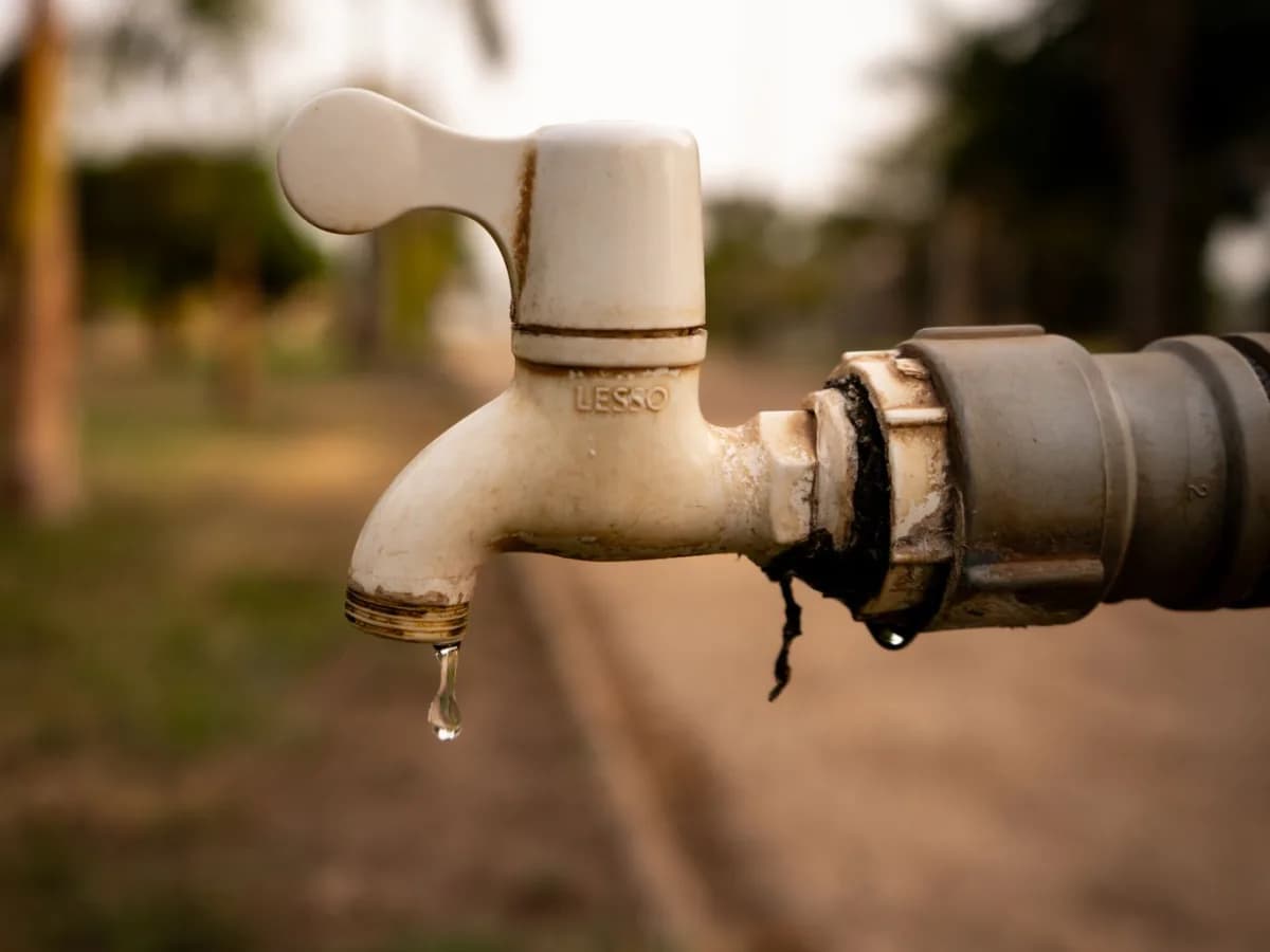 Close-up of leaky faucet in a bathroom