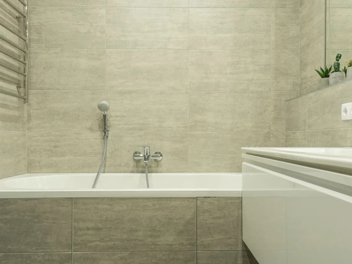 Freshly caulked bathtub ready for use