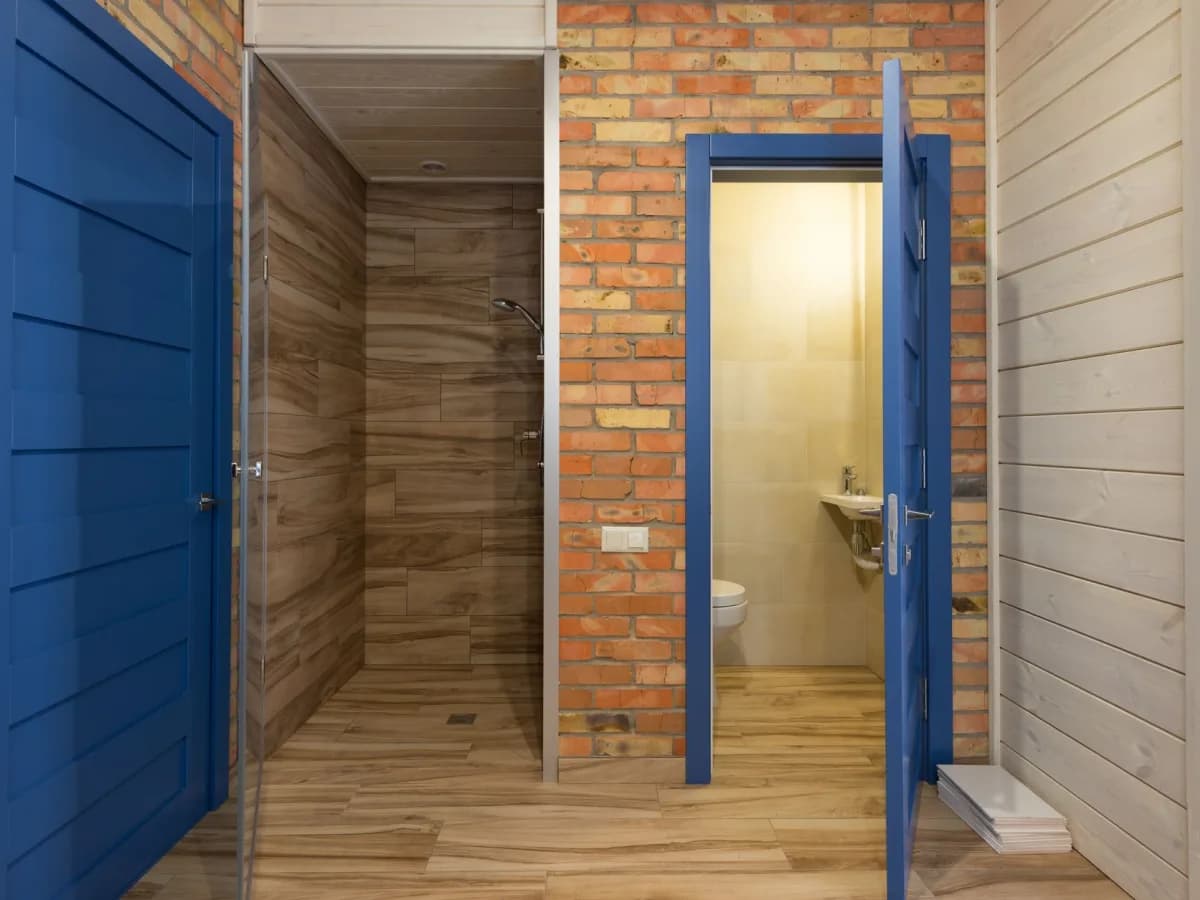Detail of shower door sealing process during installation