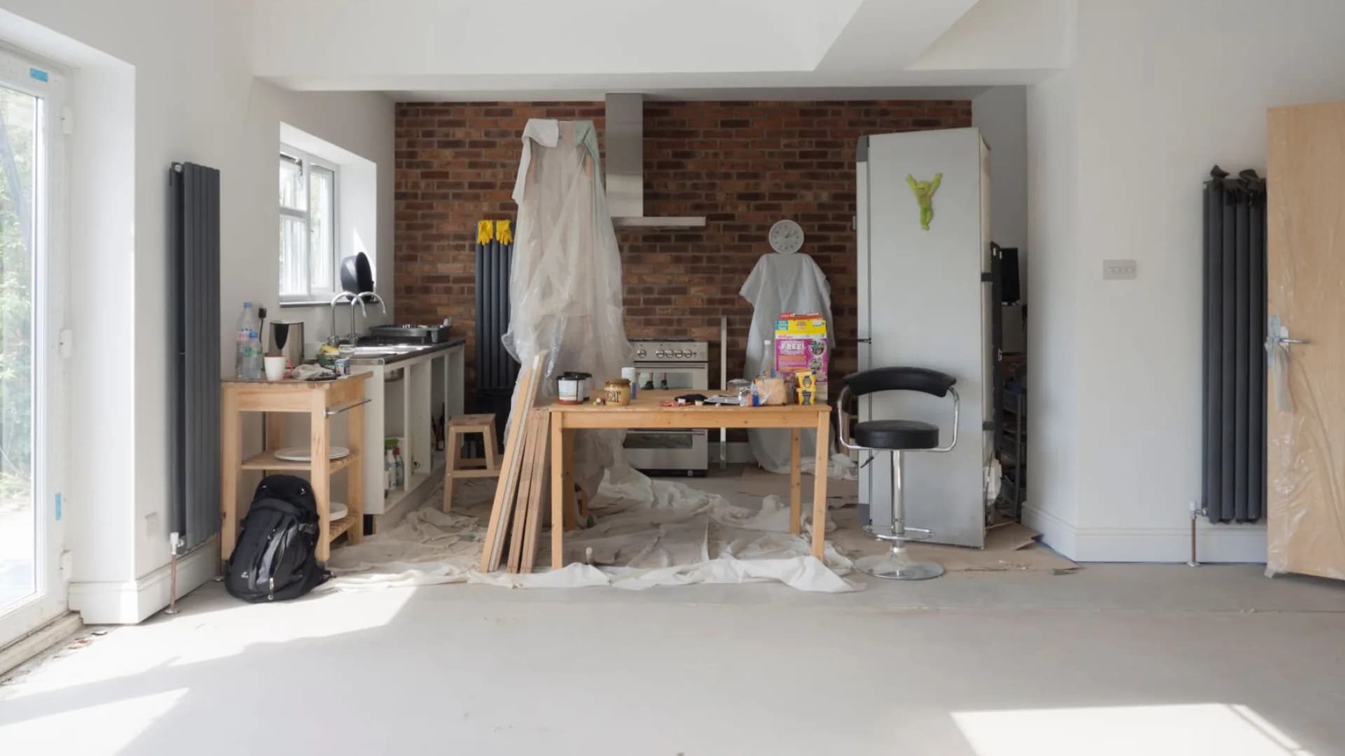 Workers renovating a kitchen in Toronto
