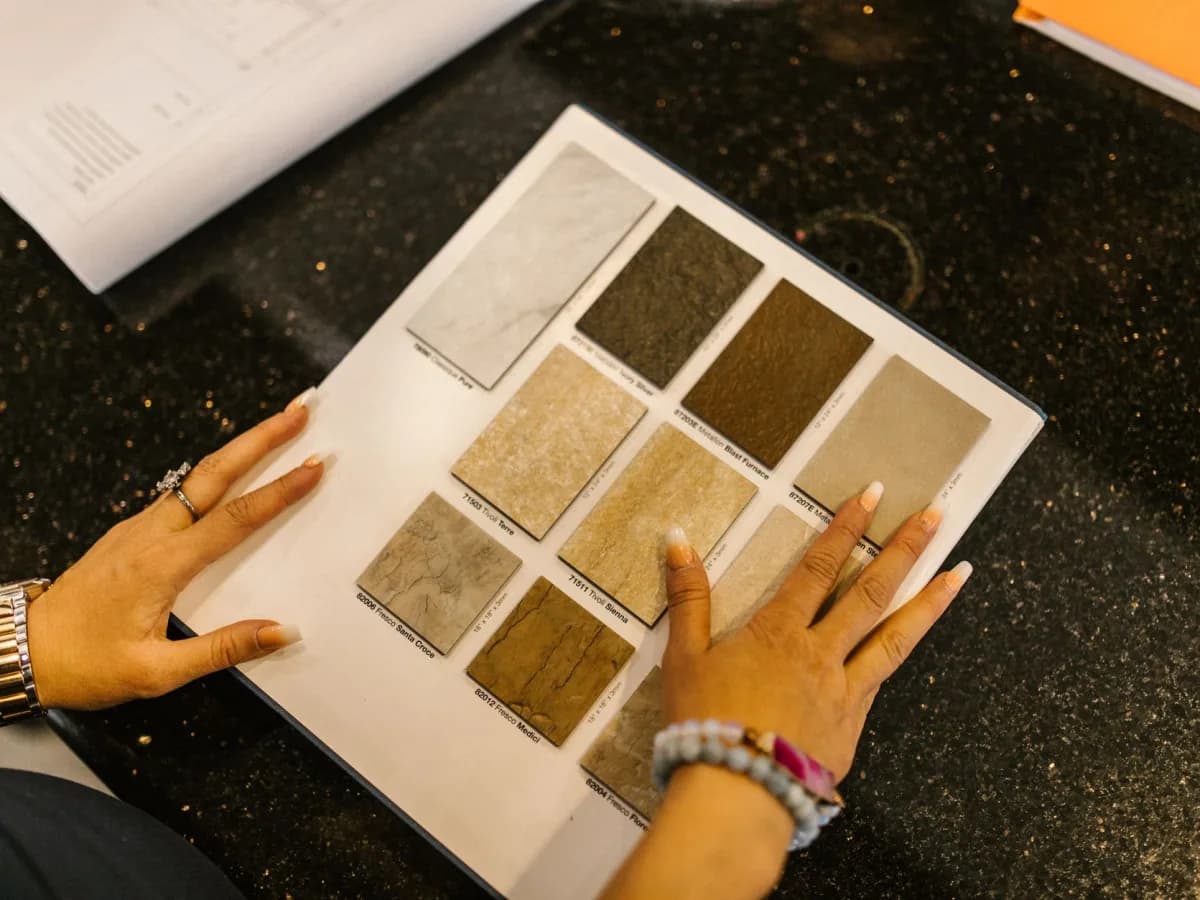 Professionals reviewing renovation plans with homeowners.